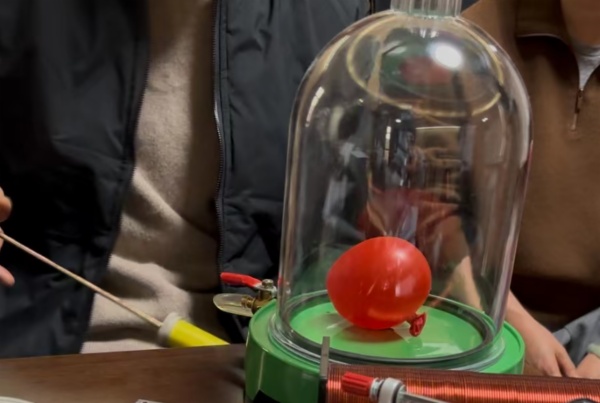 Microscale vacuum apparatus  with hand pump