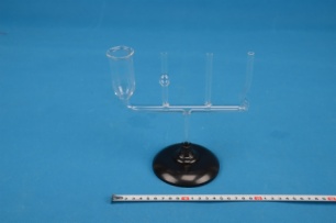 Communicating vessels with holder